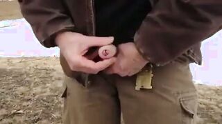 Amateur hunk with a big dick gives a wild handjob in the woods