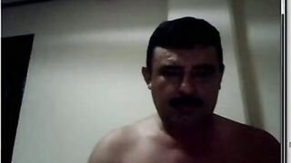 Maduro Bigoton, the homemade bear, enjoys some solo fun with his manhood