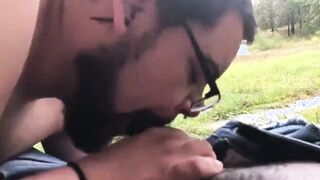 Watch this wild bearded dude deepthroat a black shaft in HD outdoor