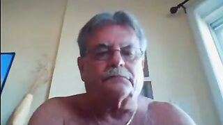 Homemade video of a kinky amateur boy giving a hot handjob to his uncle