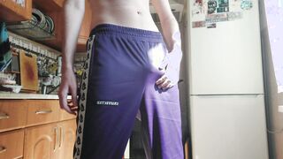 Russian dude jerks off in the kitchen in tight pants while cumming hard