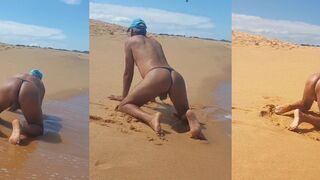 Watch this hot babe in a revealing dress strip down & get wild on the beach
