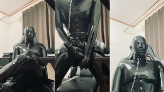 Latex fetish action with LATEXK1 in kinky latex rubber bondage and mask play