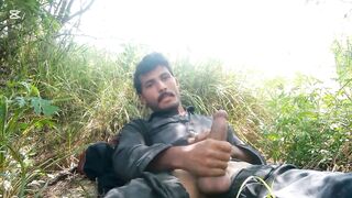 Hairy Asian dude gives a public handjob and gets a massive hard-on