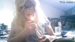Sarah Fuckpig, the filthy slut, drains a man's cigarette while flaunting lingerie and stockings