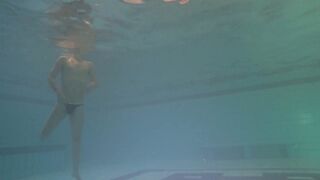 Wetnudist's tight ass takes a swim with a faux-cock underwater