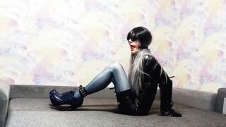 Watch this submissive crossdresser get bound and gagged in a kinky armbinder while being unable to unwind his ties